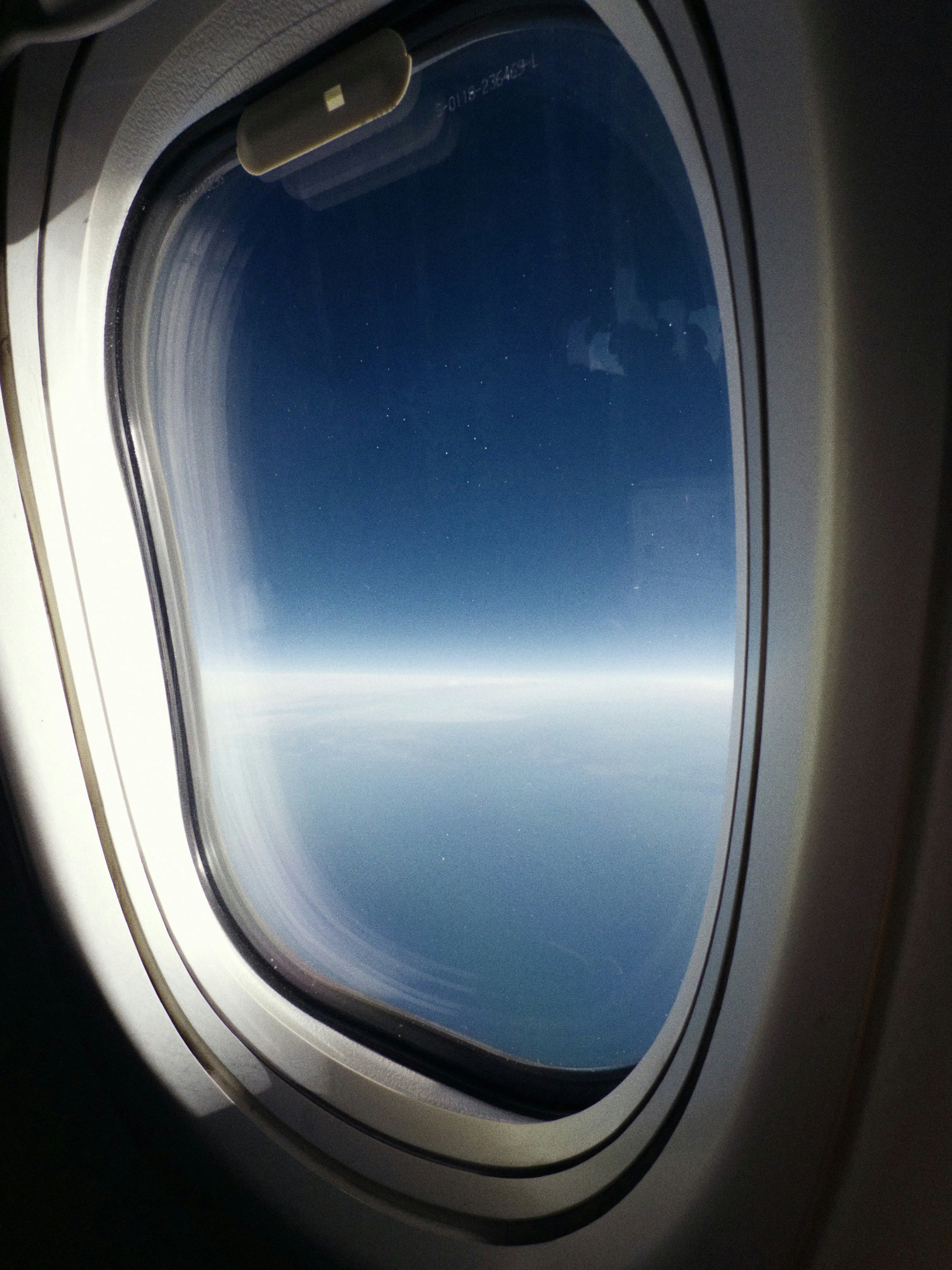 View of the ocean from an airplane window photo – Free Travel Image on ...