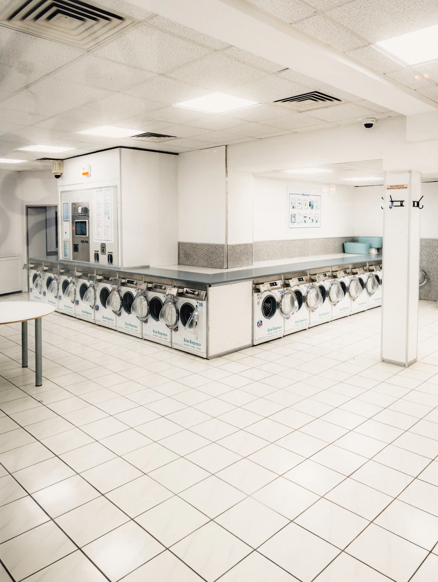 Freshly folded laundry stacked neatly in a bright clean setting