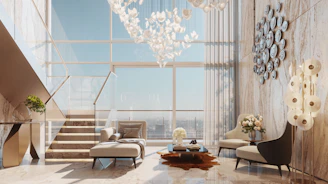 Luxurious modern living room with large windows and staircase