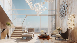 Luxurious modern living room with large windows and staircase