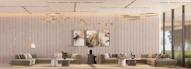 Modern lounge area with sectional sofas and artwork.