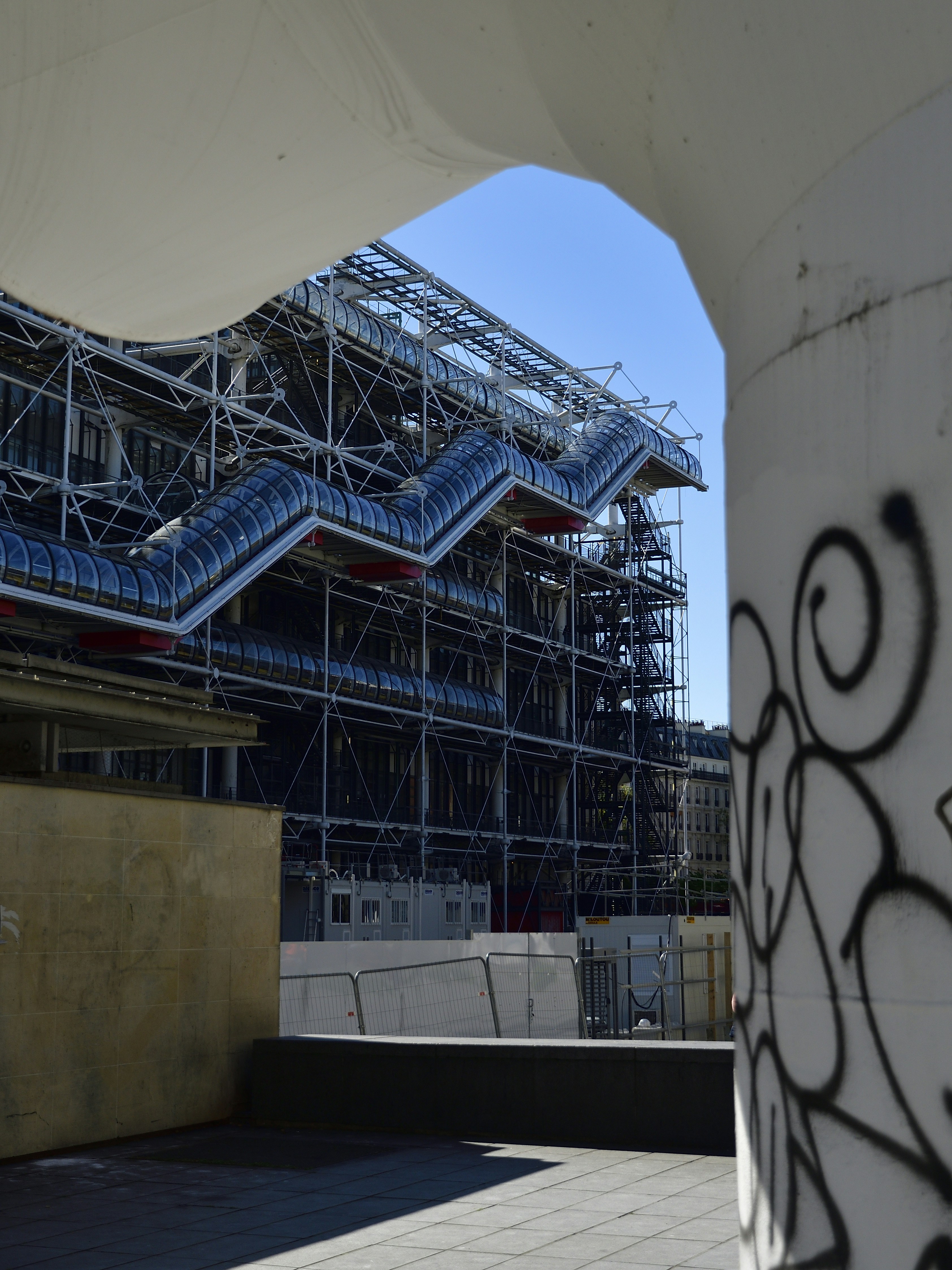Modern architecture with external staircase and pipes