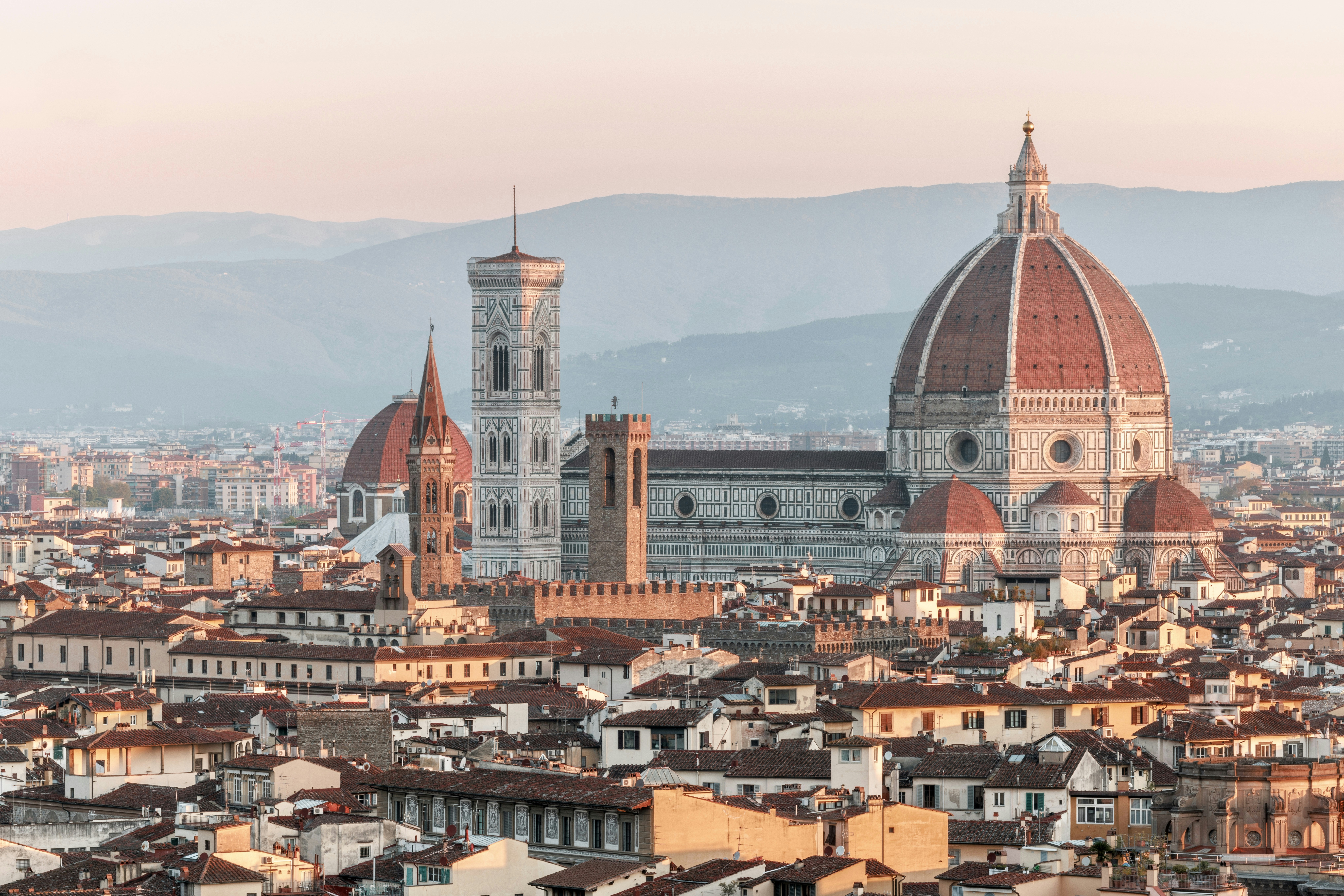 Florence cityscape with duomo cathedral at sunrise