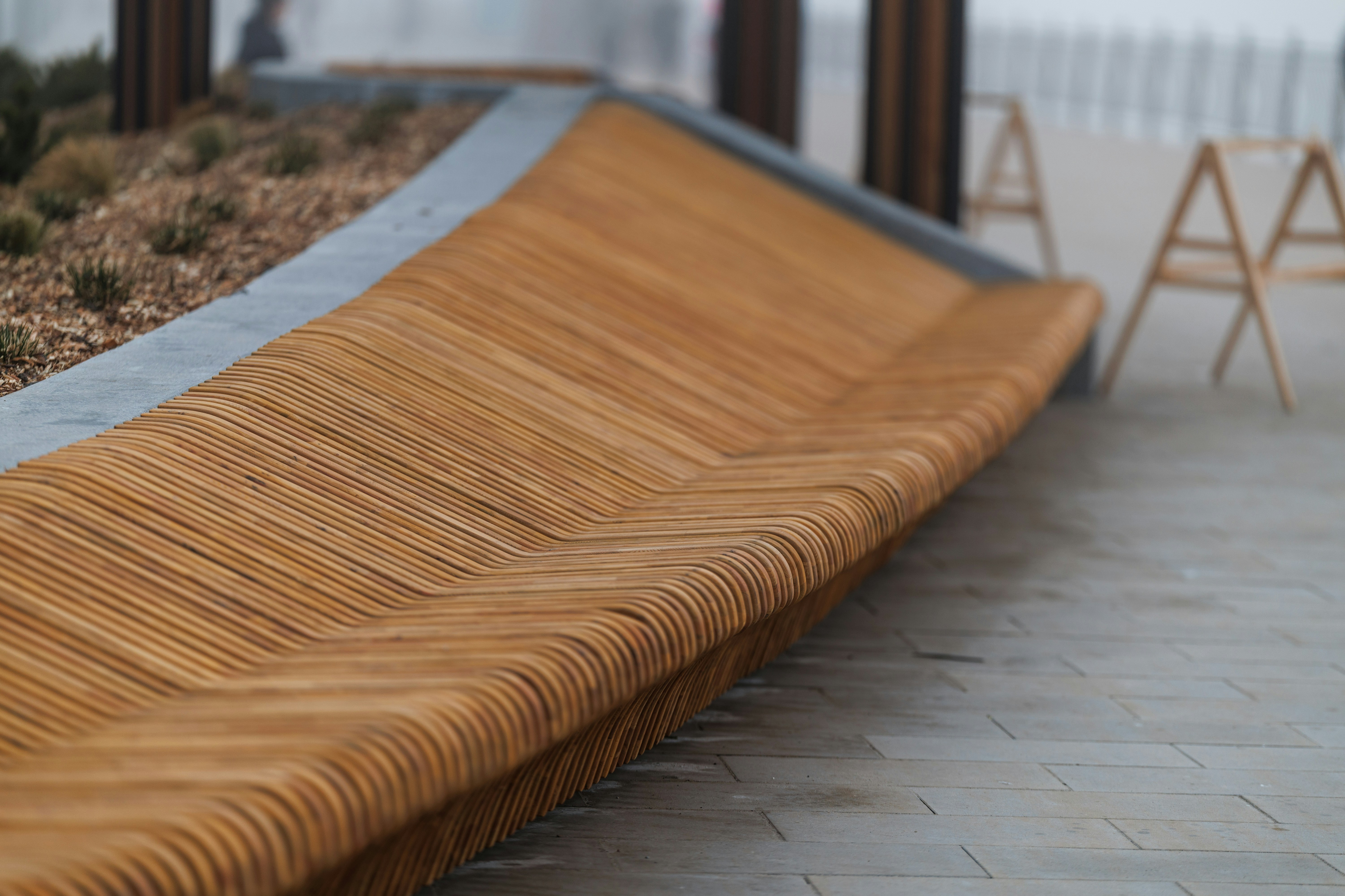 Curved wooden bench with modern design