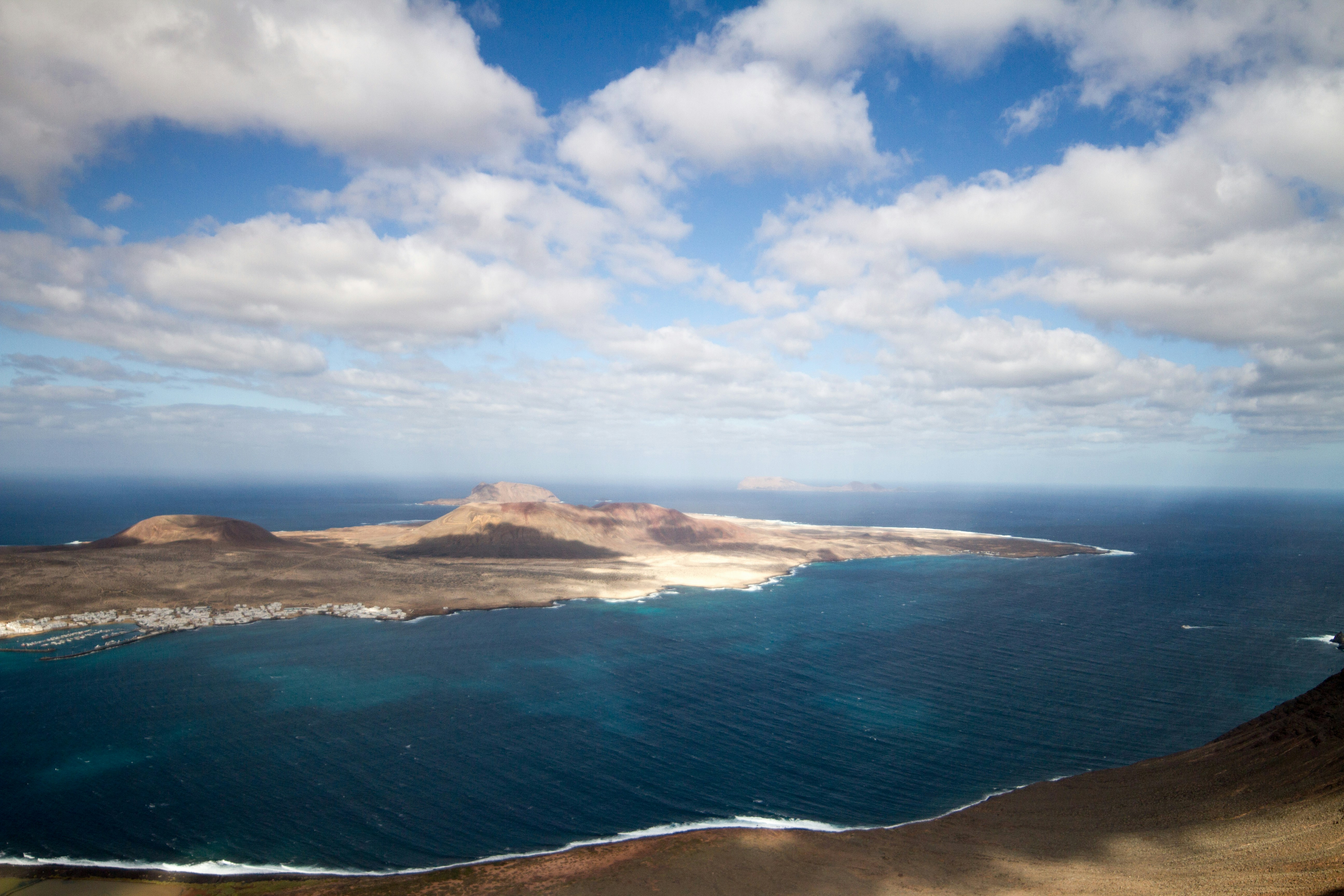 Island landscape with ocean and dramatic clouds