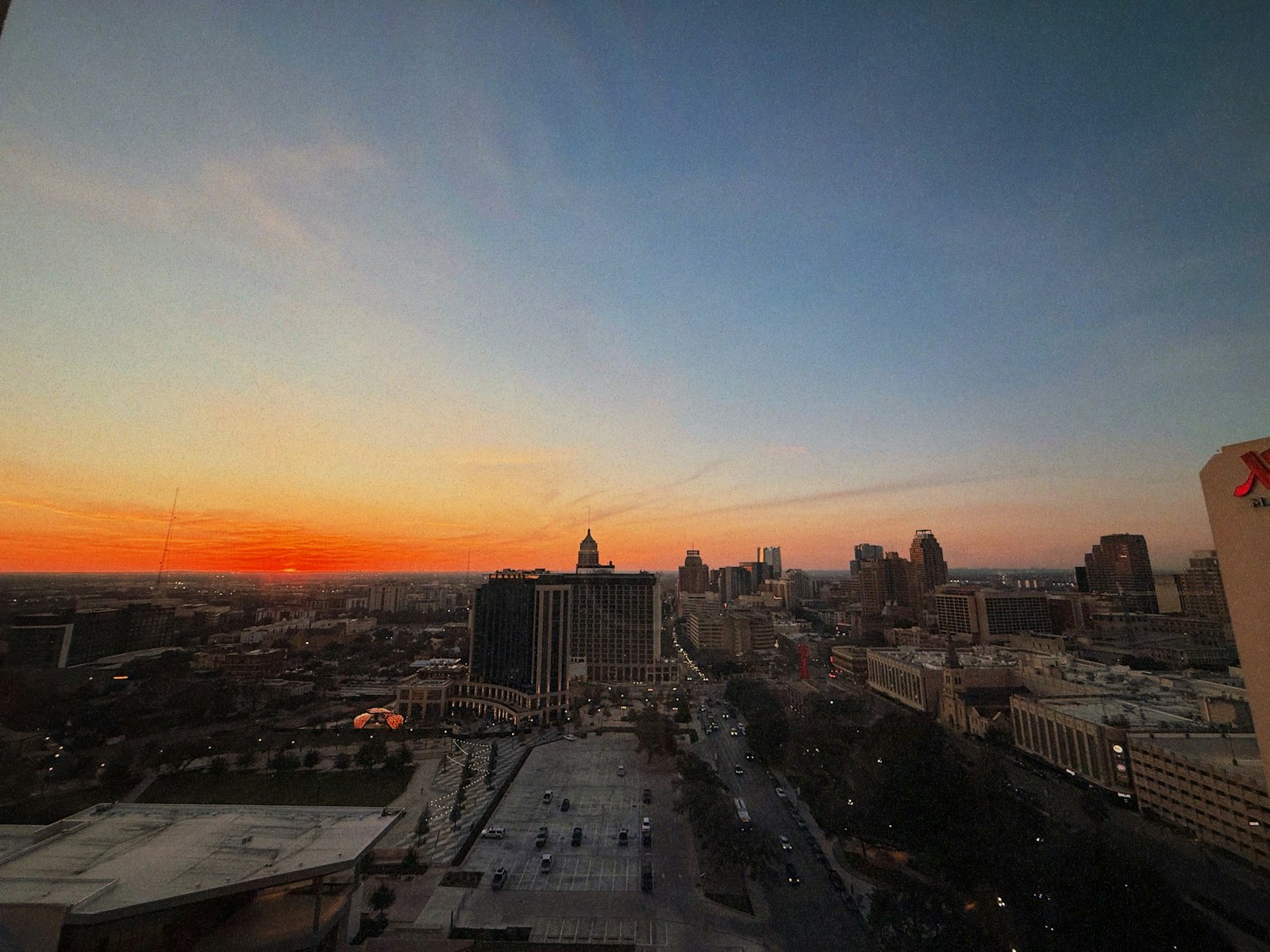 San Antonio TX skyline at sunset near Converse and JBSA — Sharp Realty Group 2026