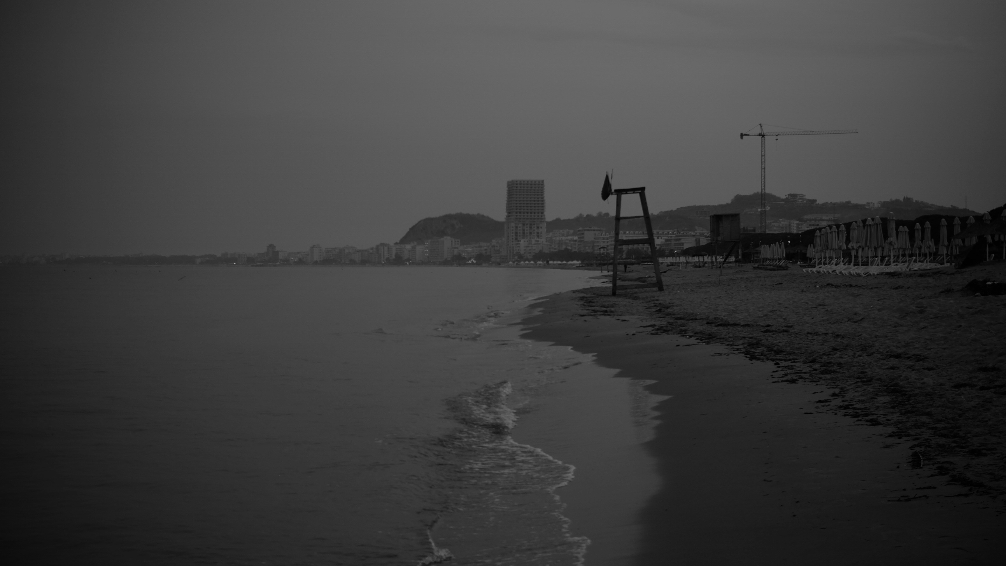 Lifeguard tower on a desolate beach at dusk