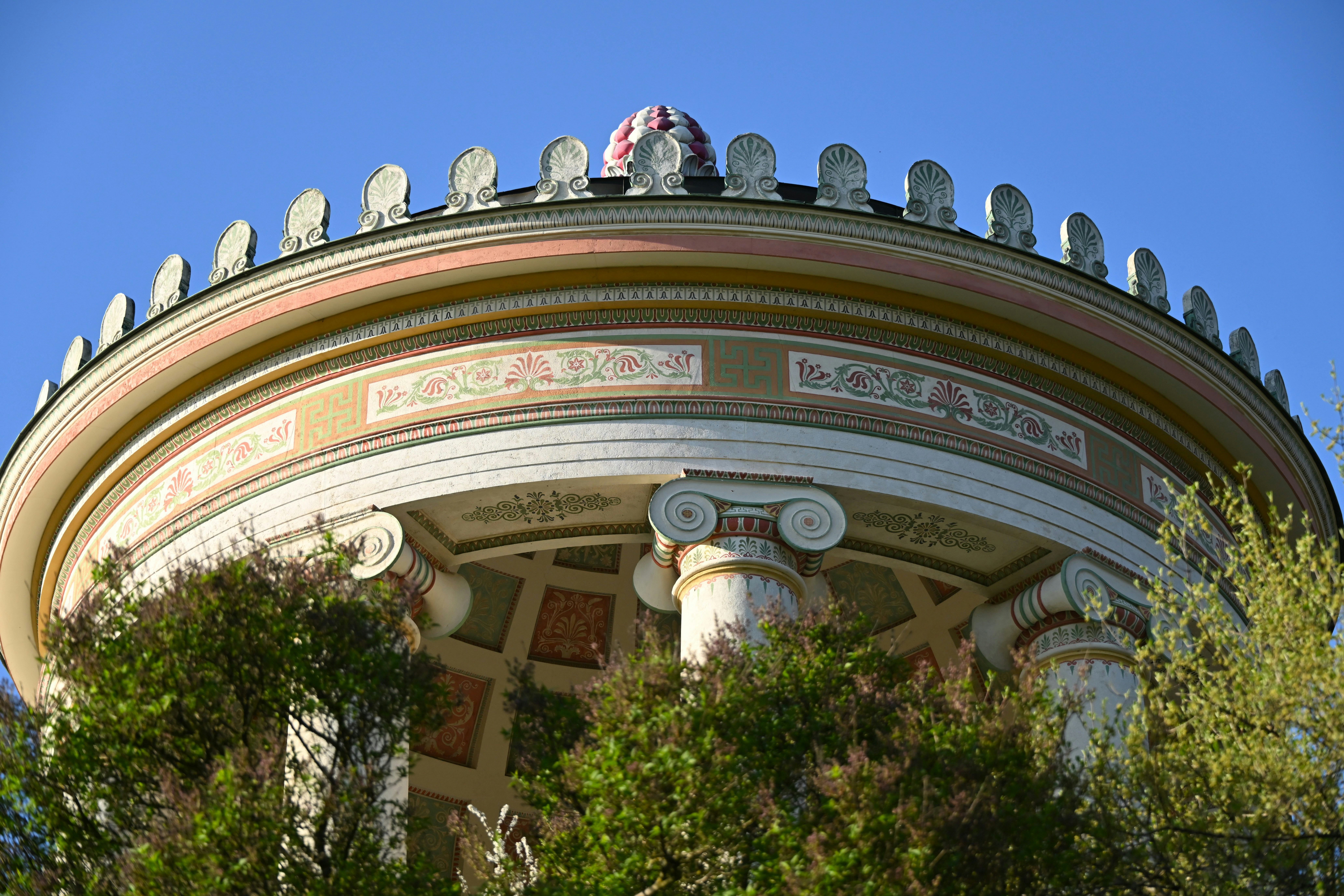 Circular building with columns and decorative details