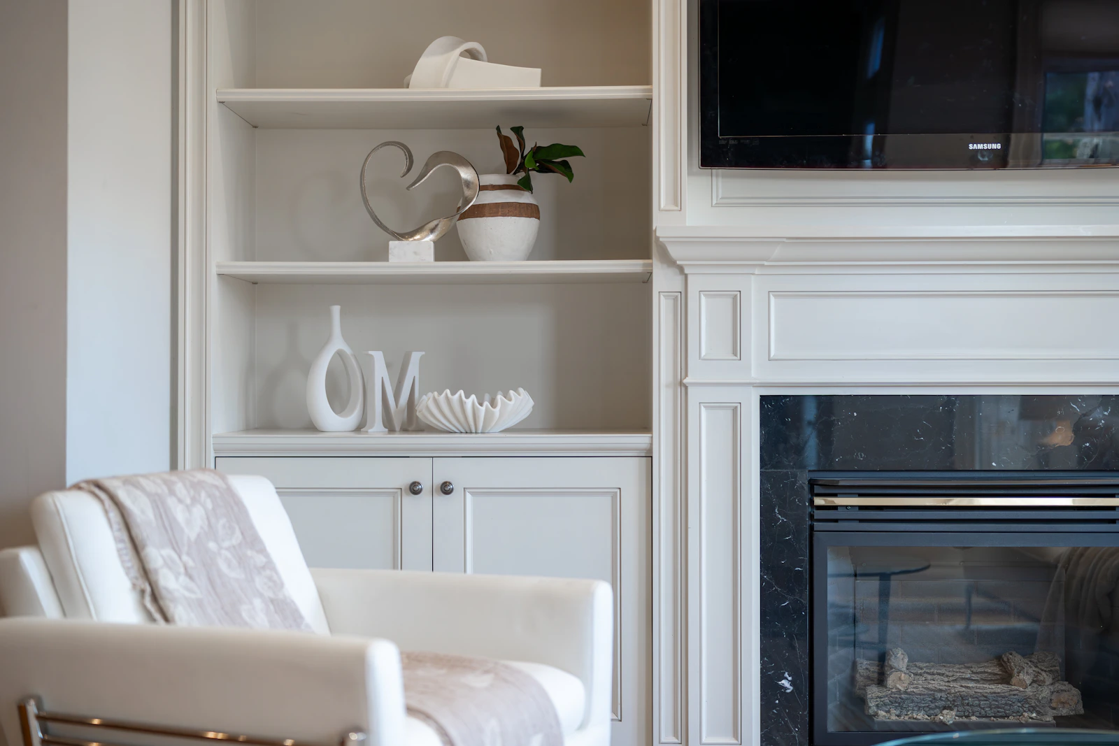 Sculptural decorative objects styled on refined interior shelving
