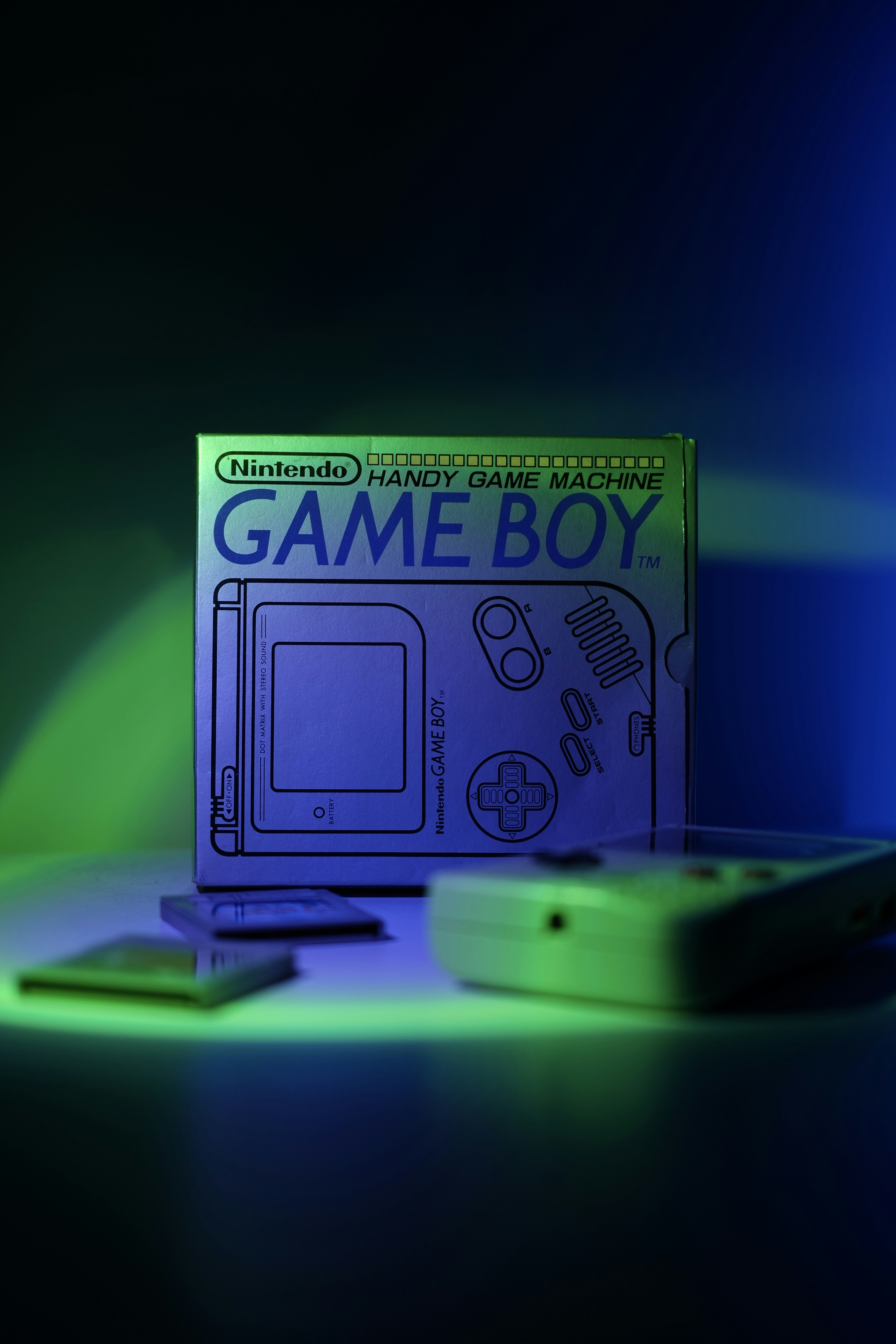 Nintendo game boy box with console and cartridges
