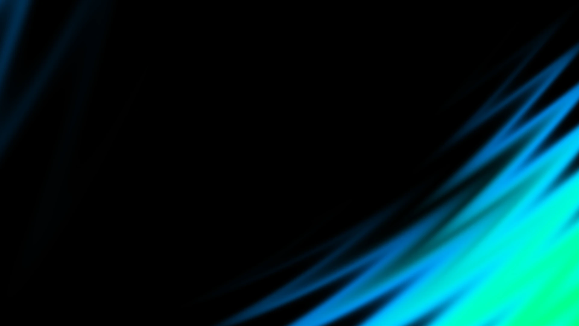 Abstract blue and green light streaks on black background