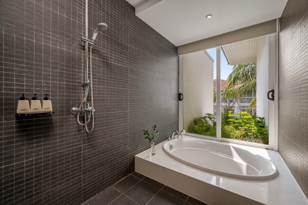 Modern bathroom with bathtub and shower