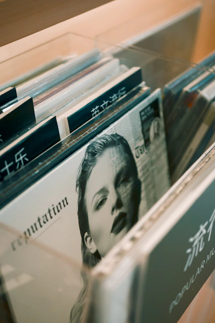 Taylor swift's "reputation" album cover in a record store.