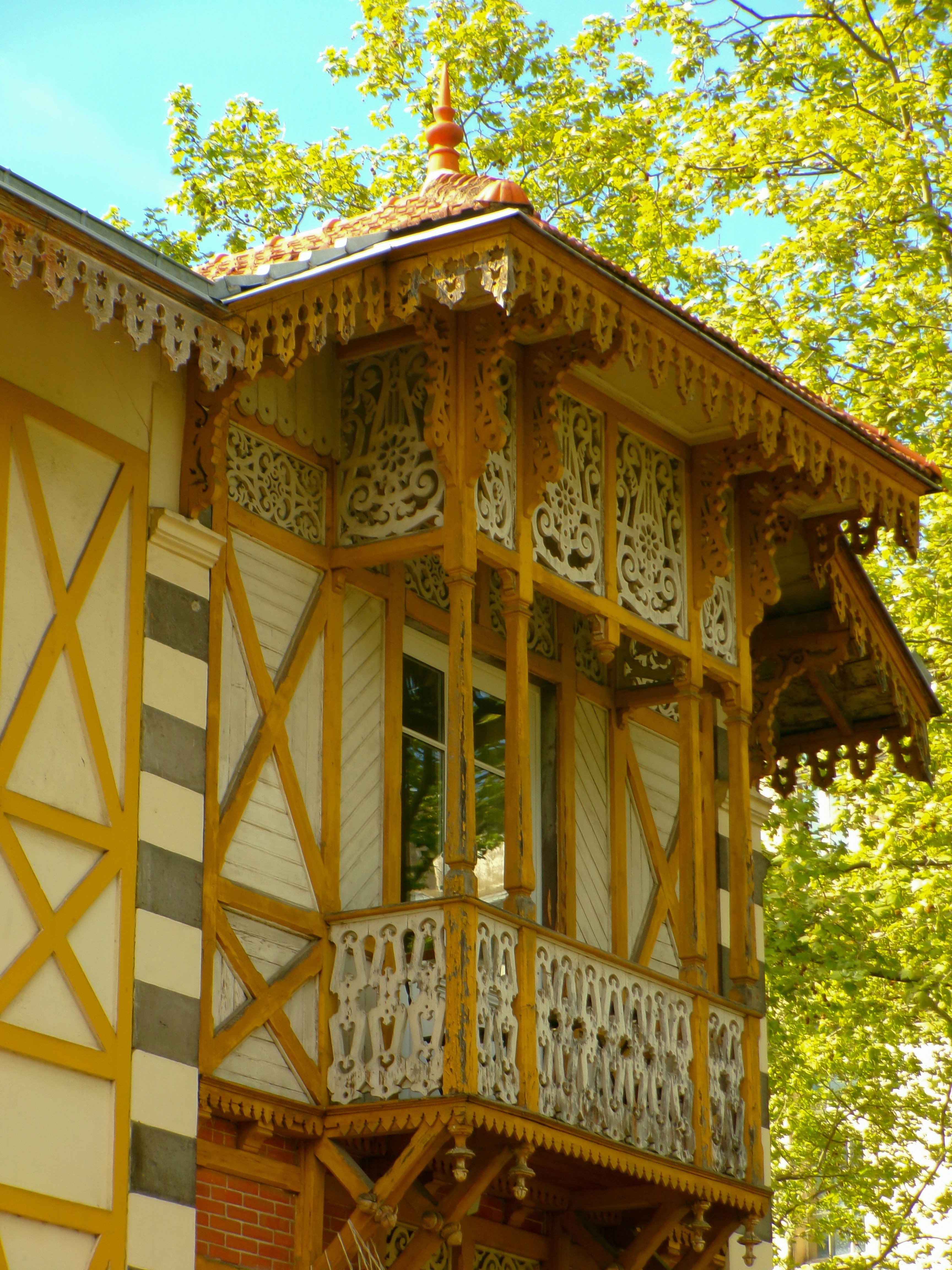 Ornate wooden balcony on a historic building, Leaside family streetscape and inter-war detached architecture