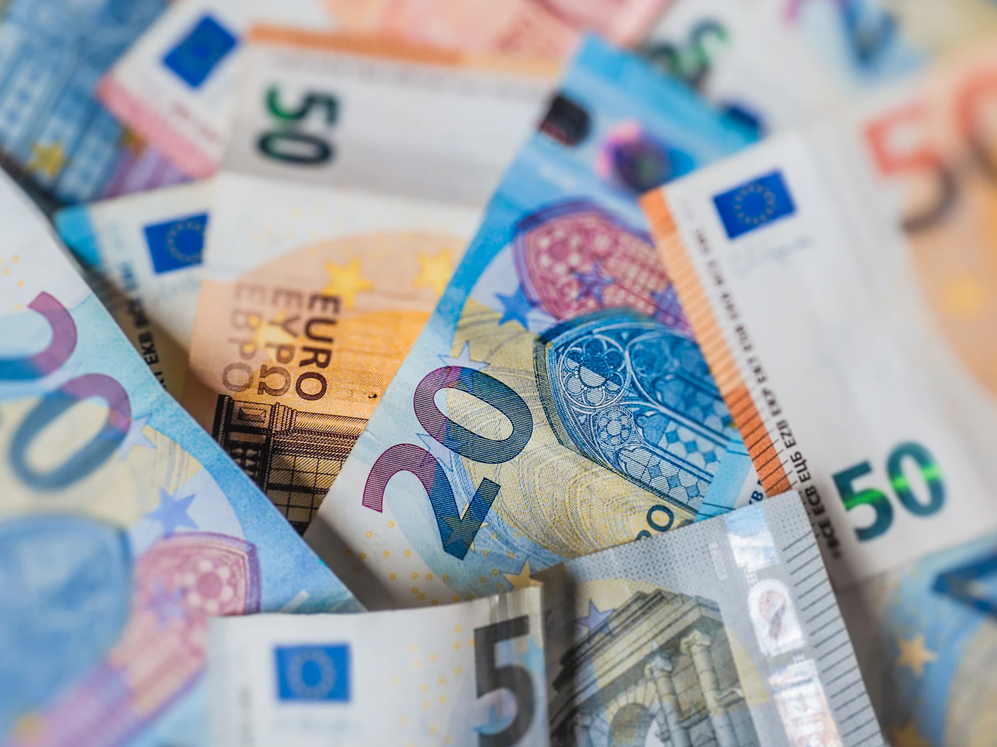 Close-up photograph of colorful euro banknotes