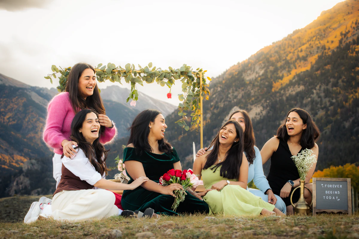 A group of women laughing together outdoors