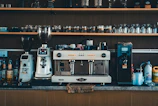 Espresso machine and coffee grinder on counter