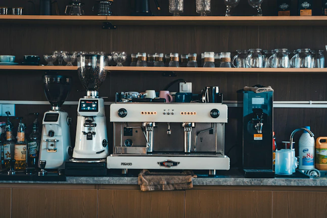 Espresso machine and coffee grinder on counter