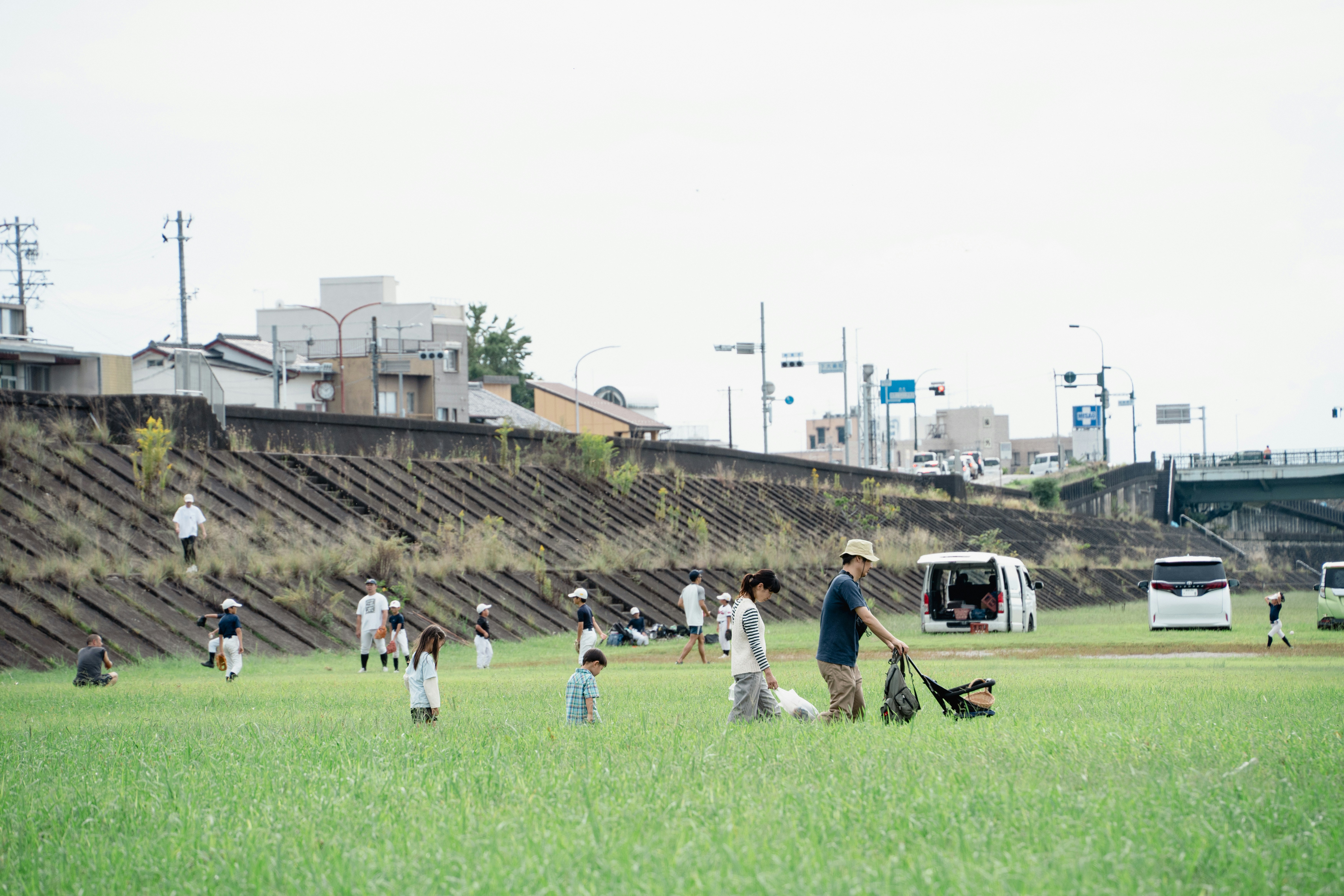 family playing baseball