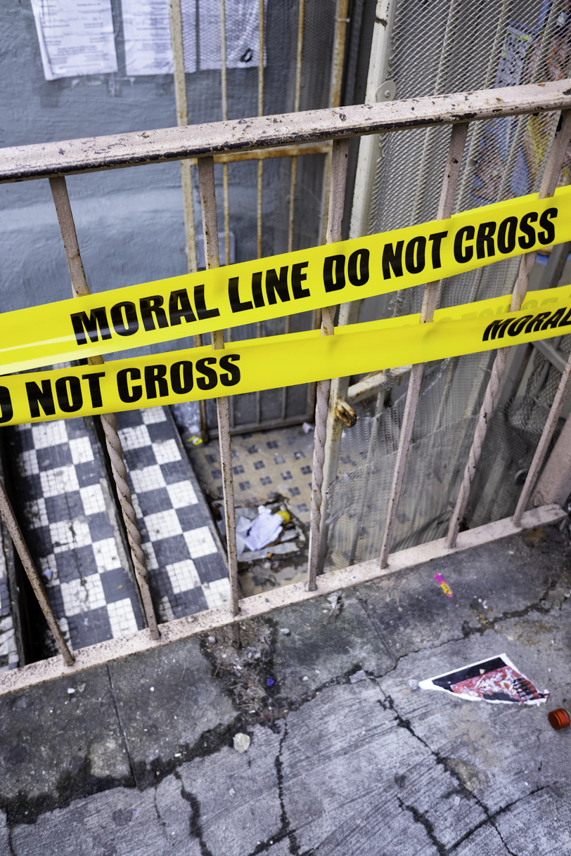 Yellow caution tape with "do not cross" text.