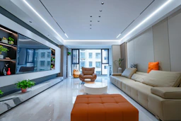 Modern living room with sectional sofa and large window