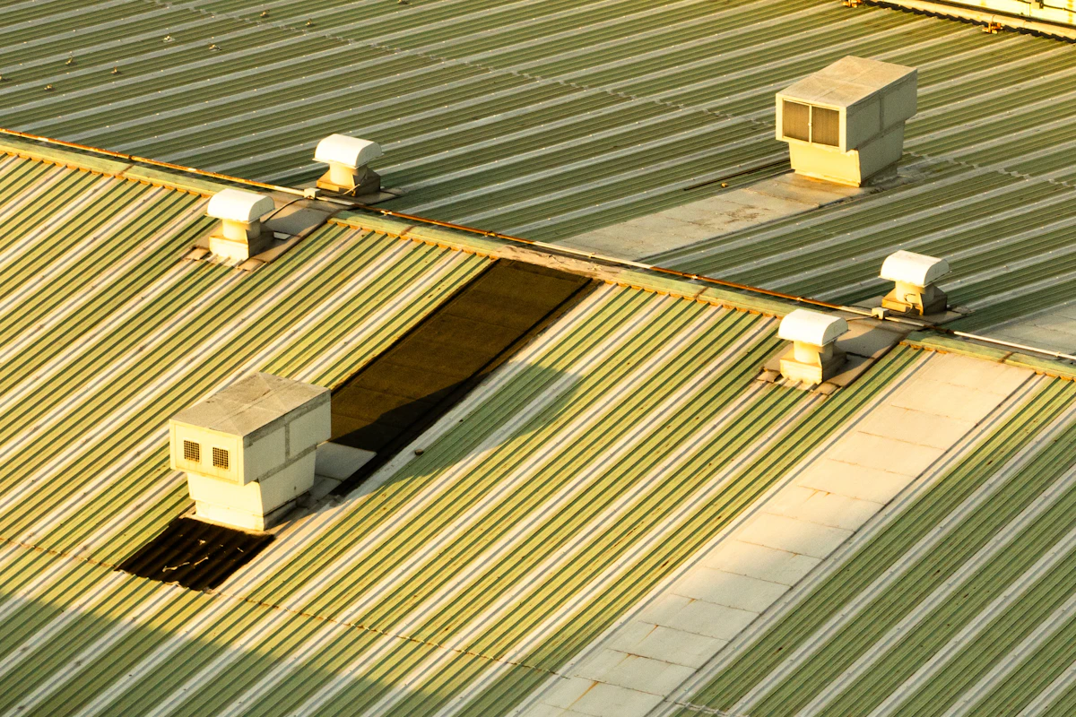 Flat roofing system with rooftop equipment on a Dallas TX commercial building
