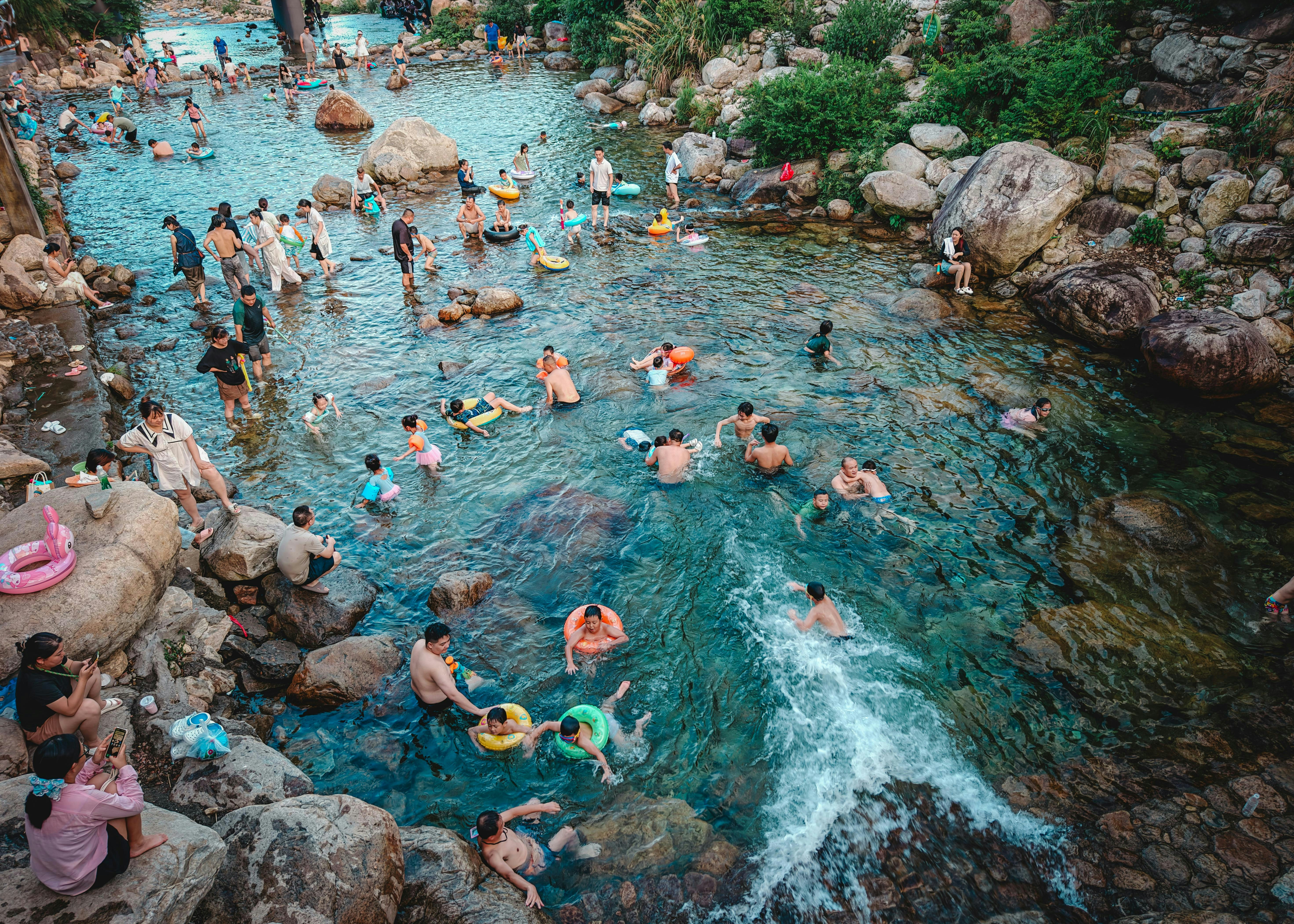 People swimming and relaxing in a natural river pool. photo – Free ...