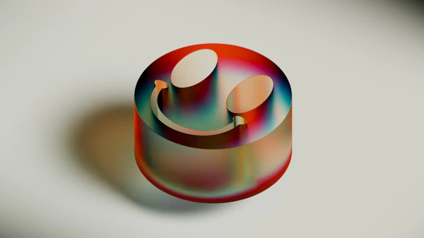 A 3D render of a smiley face with headphones