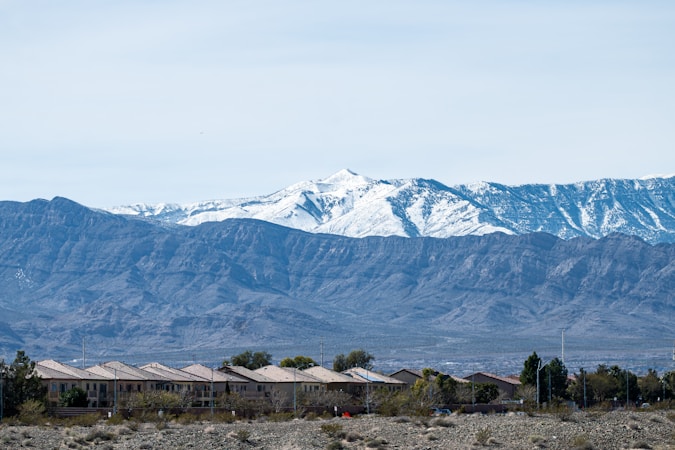 Row of Las Vegas valley homes with mountains rising behind them, similar to the northwest neighborhoods near the proposed arena site