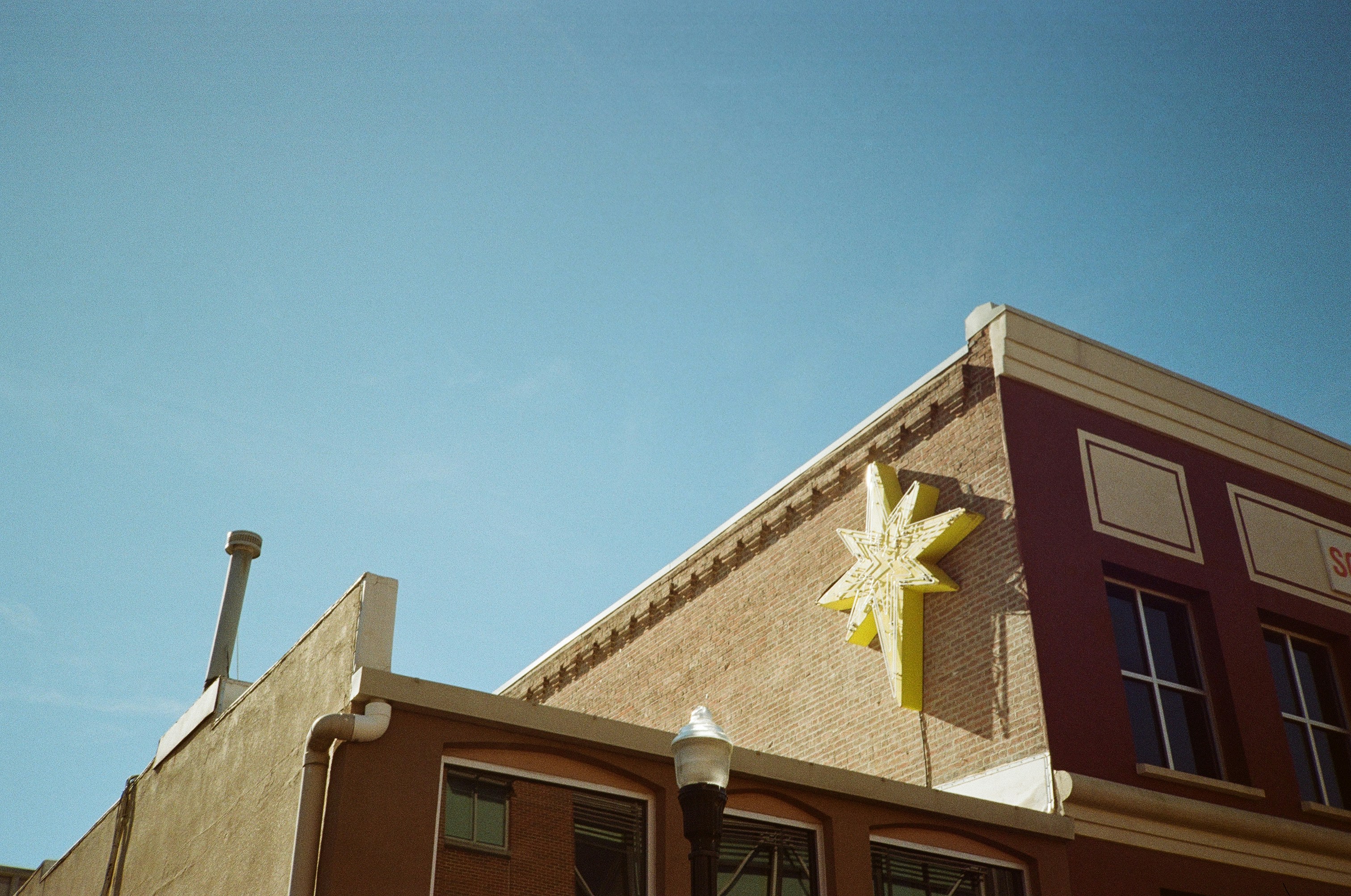 Building with a large yellow star sign