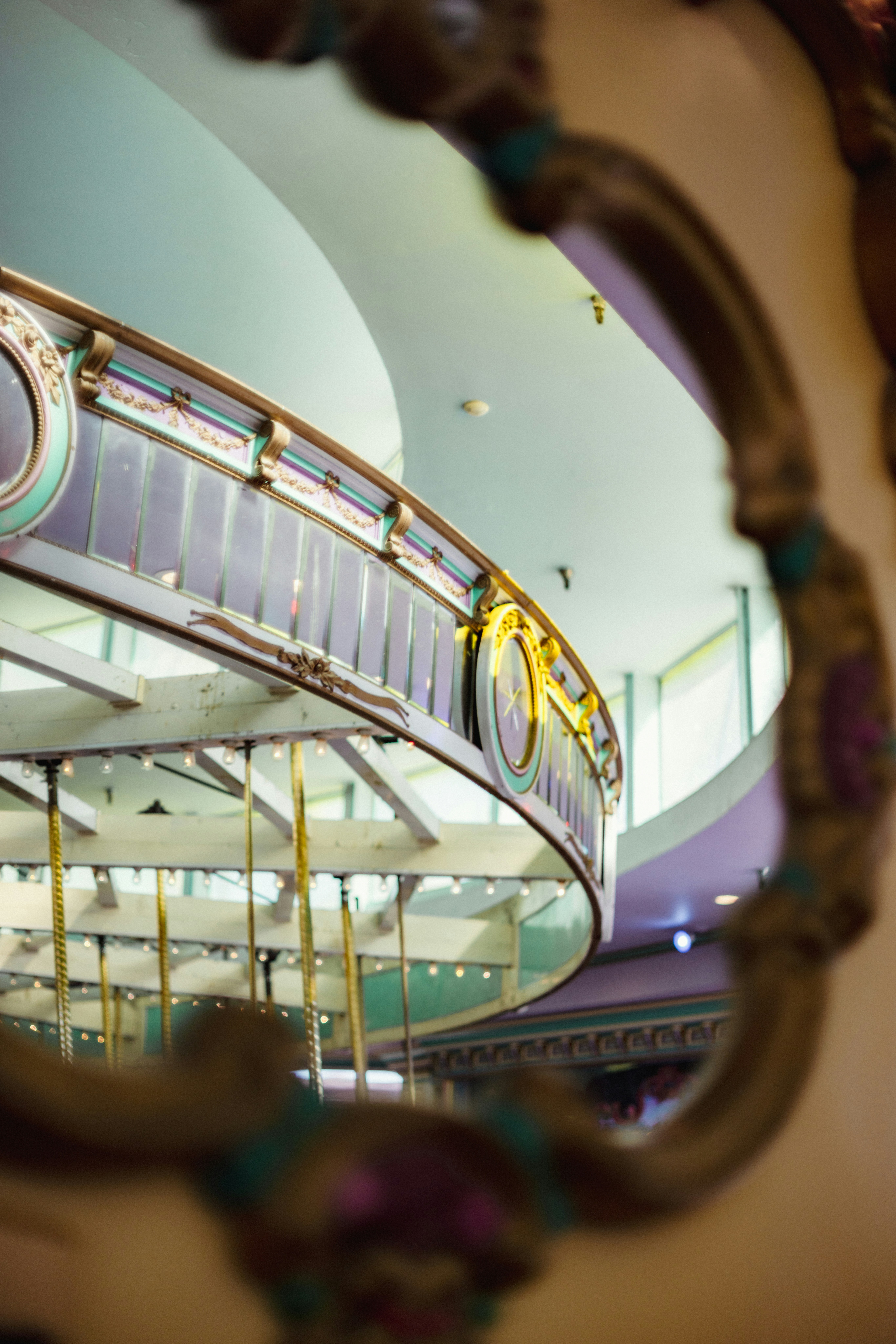 Ornate carousel railing with soft lighting