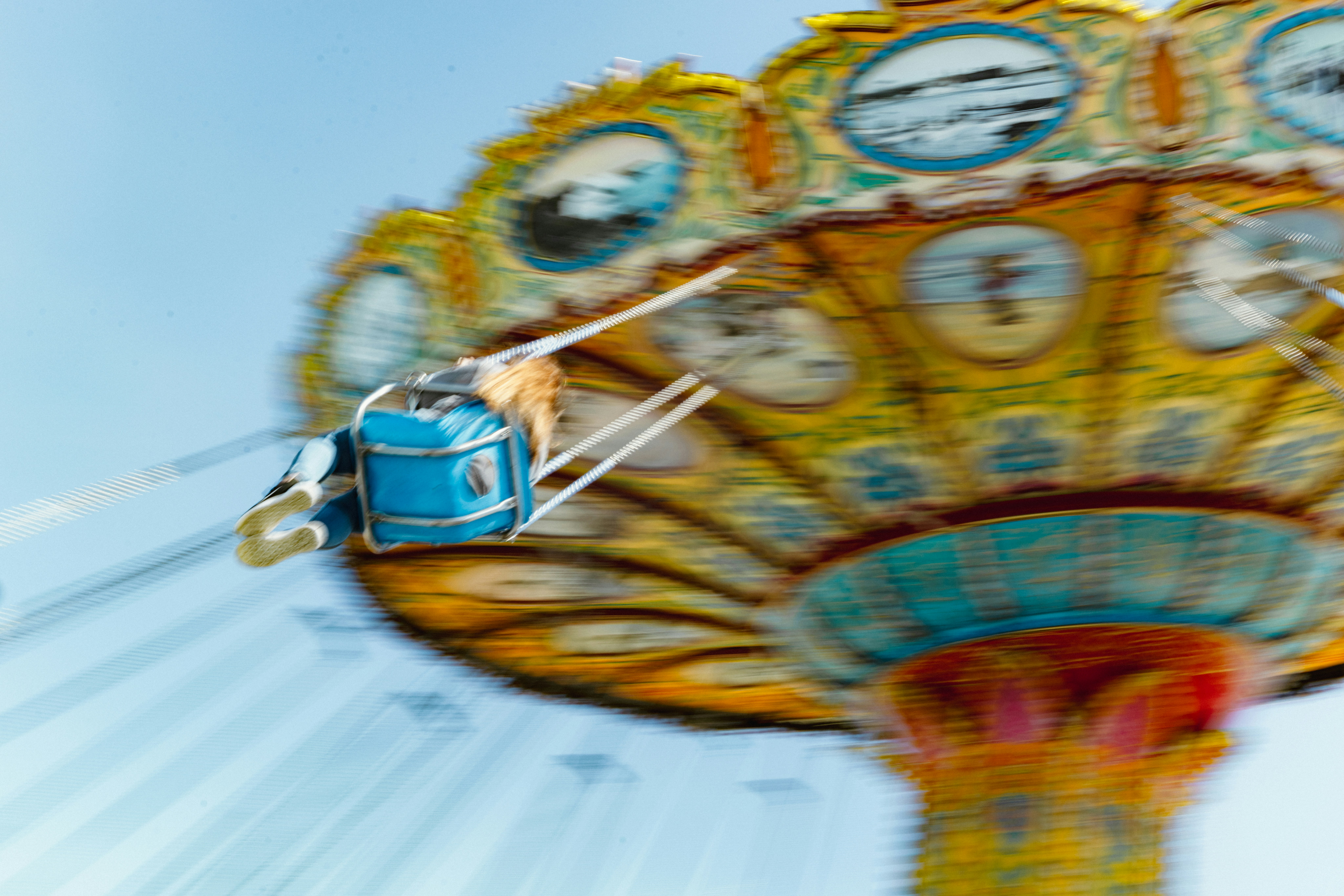 A person on a spinning carnival ride