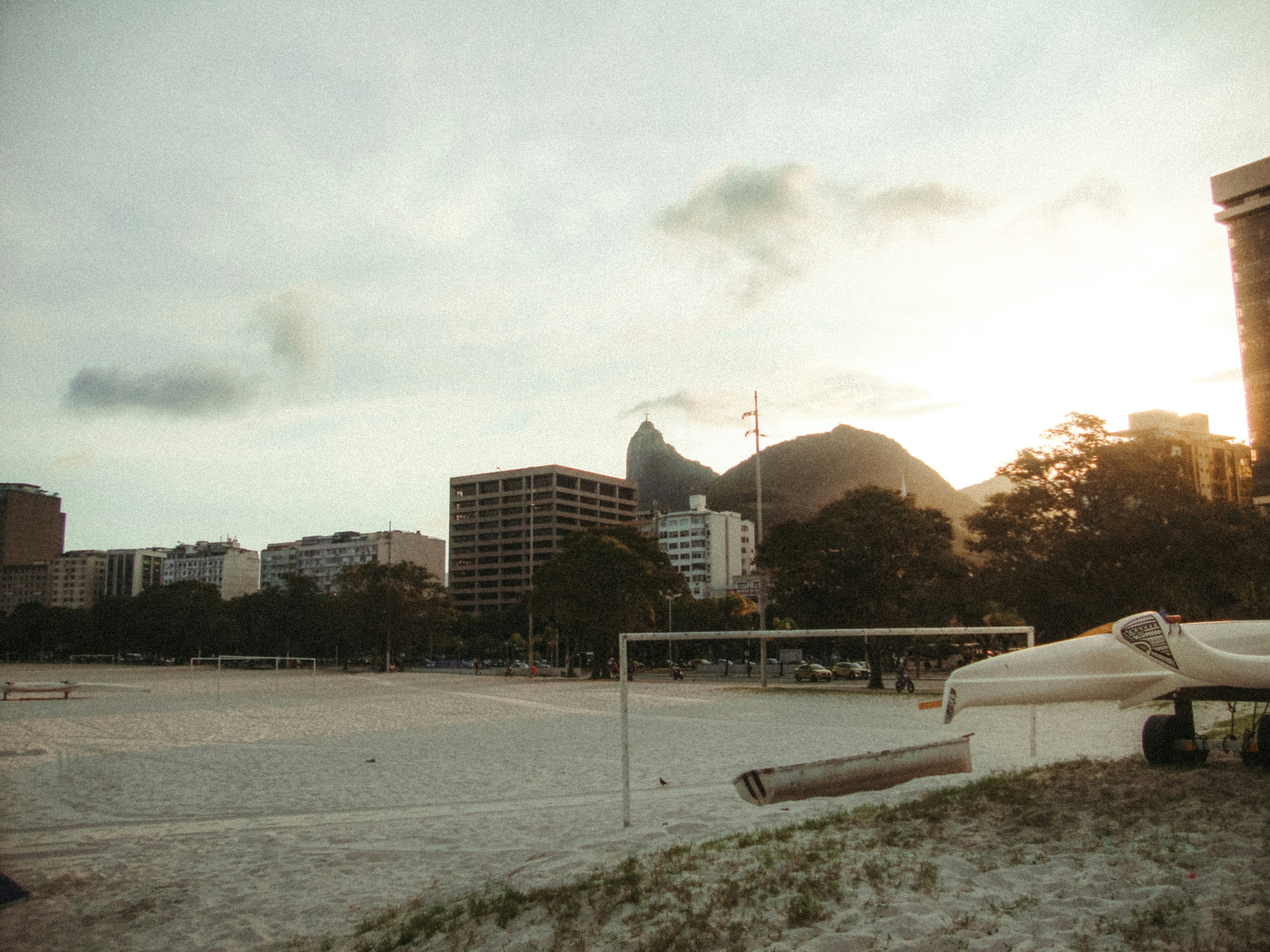 City skyline with mountains at sunset