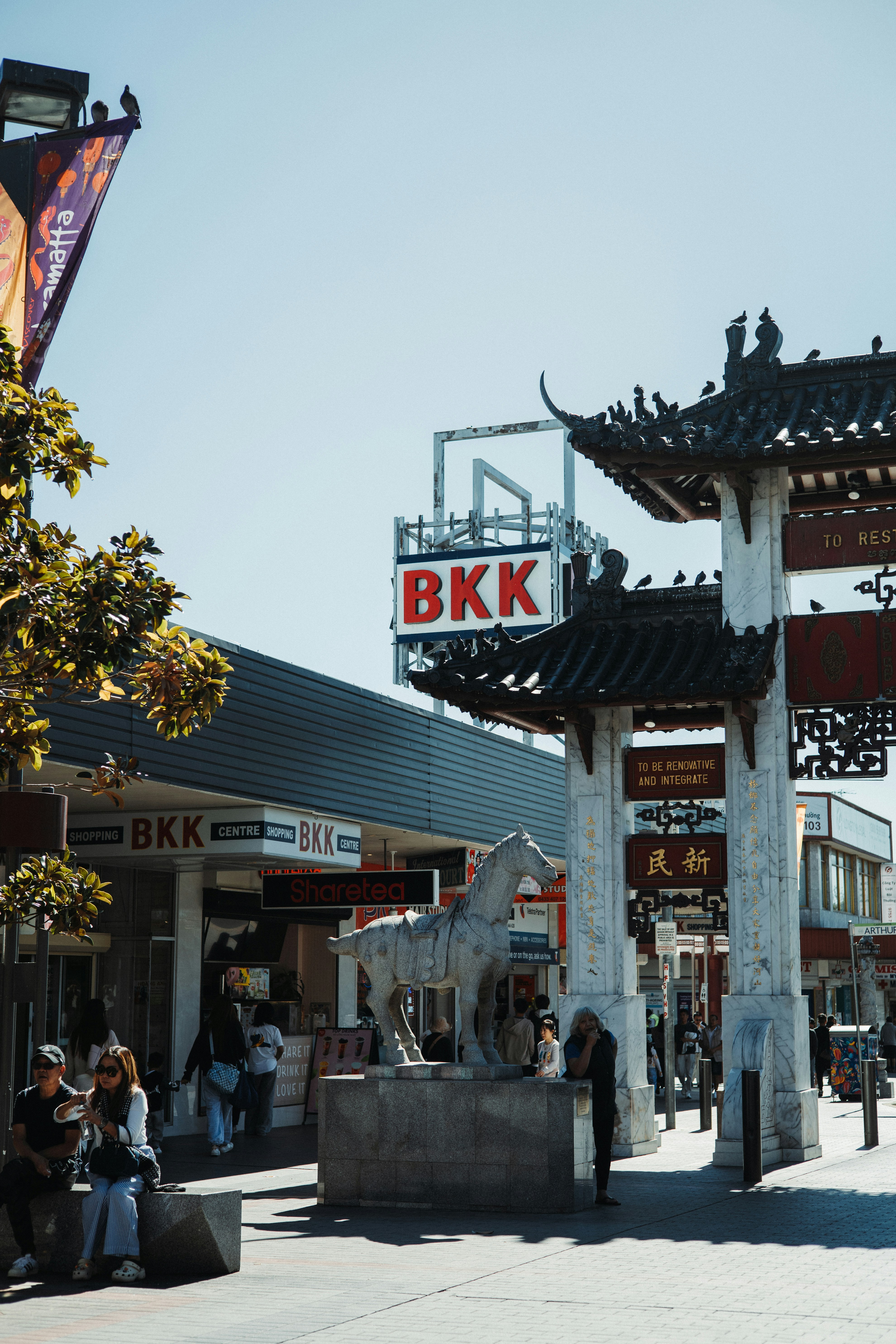 Chinatown gate with horse statue and bkk sign