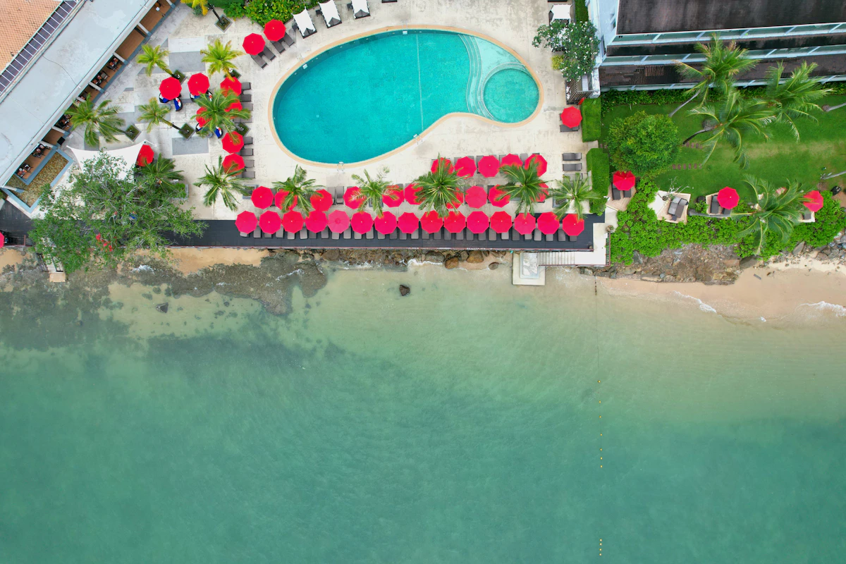 resort saltwater pool at golden hour, prairie beyond