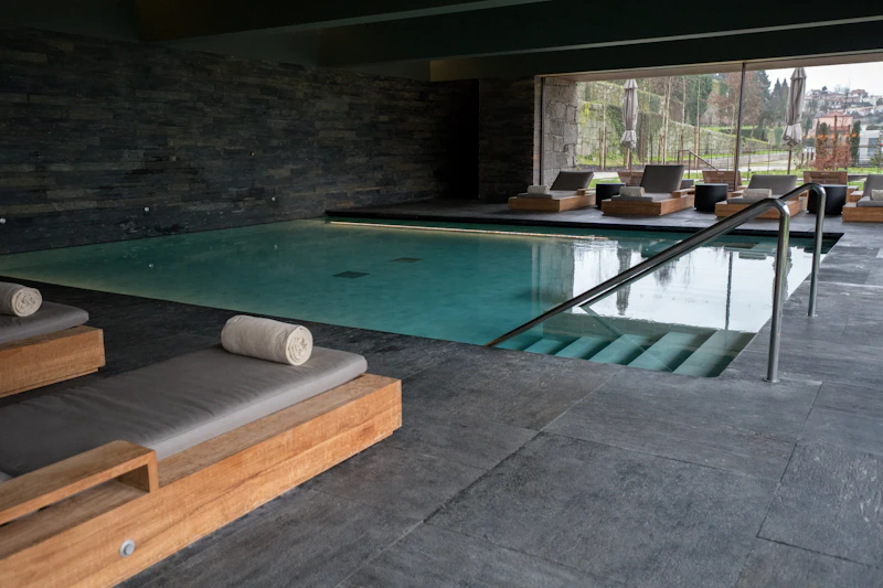 Indoor thermal pool with moody lighting