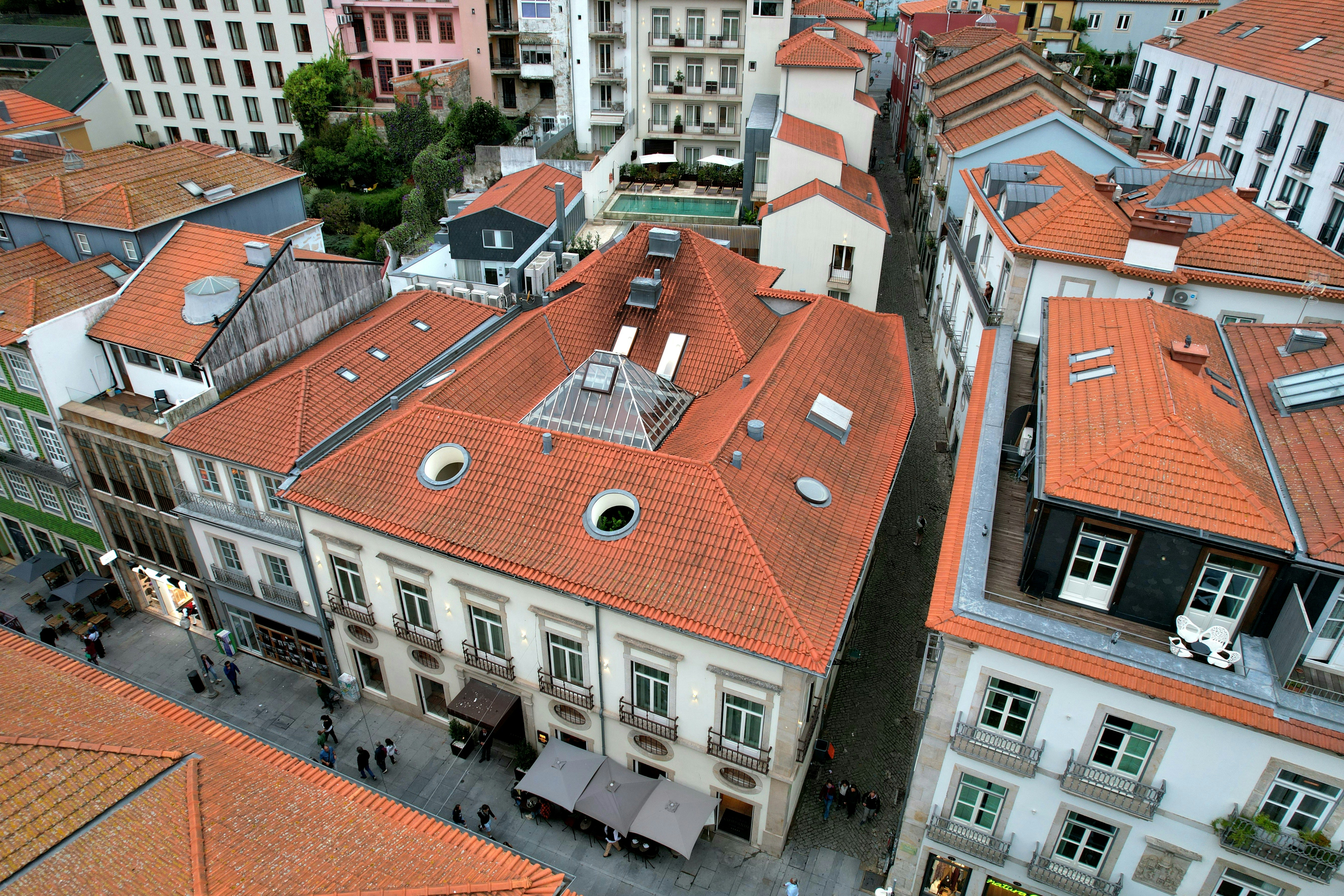 Aerial view of european city rooftops and streets.