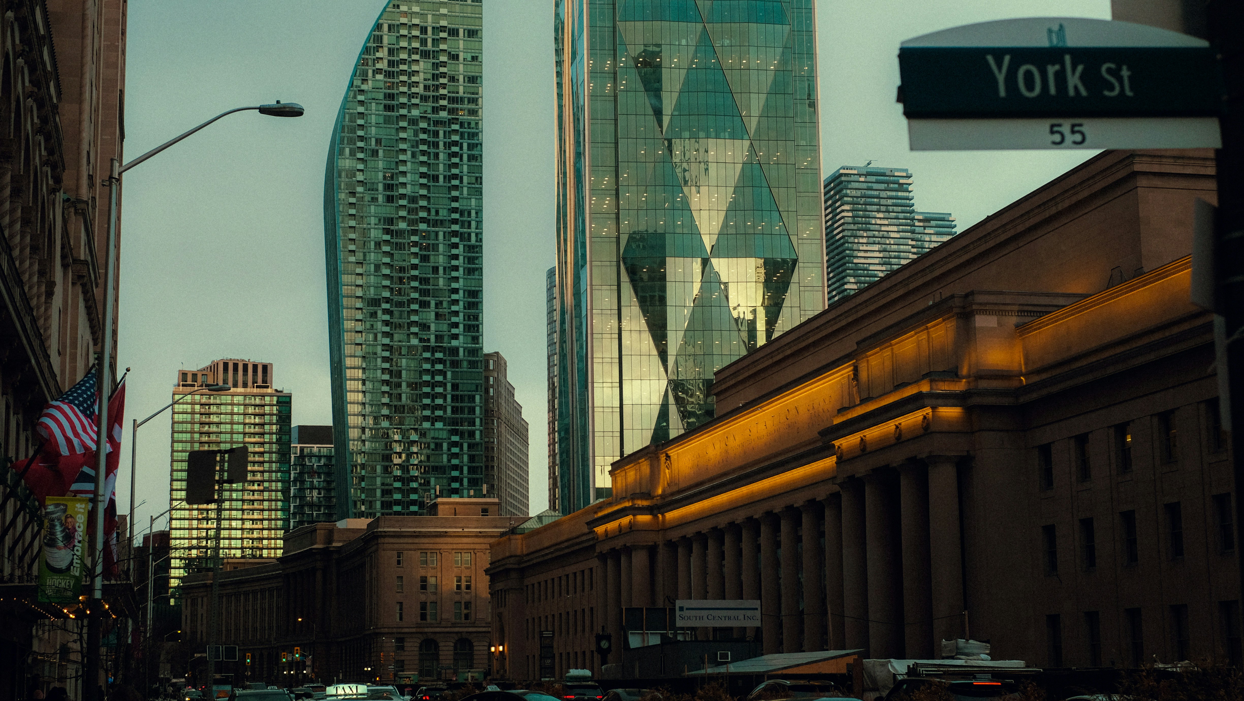 Modern skyscrapers behind a historic building on york street.