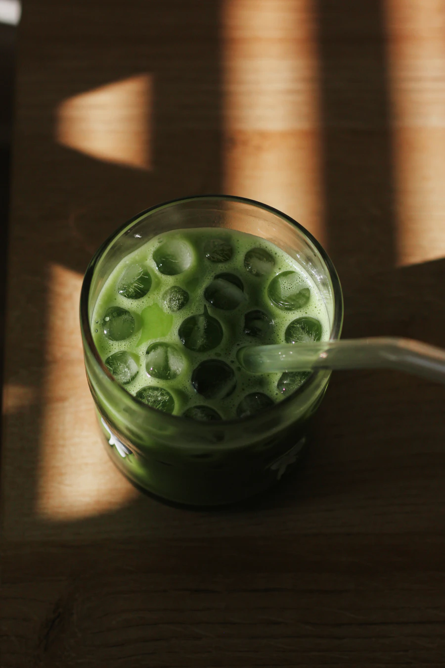 An iced matcha latte in a glass
