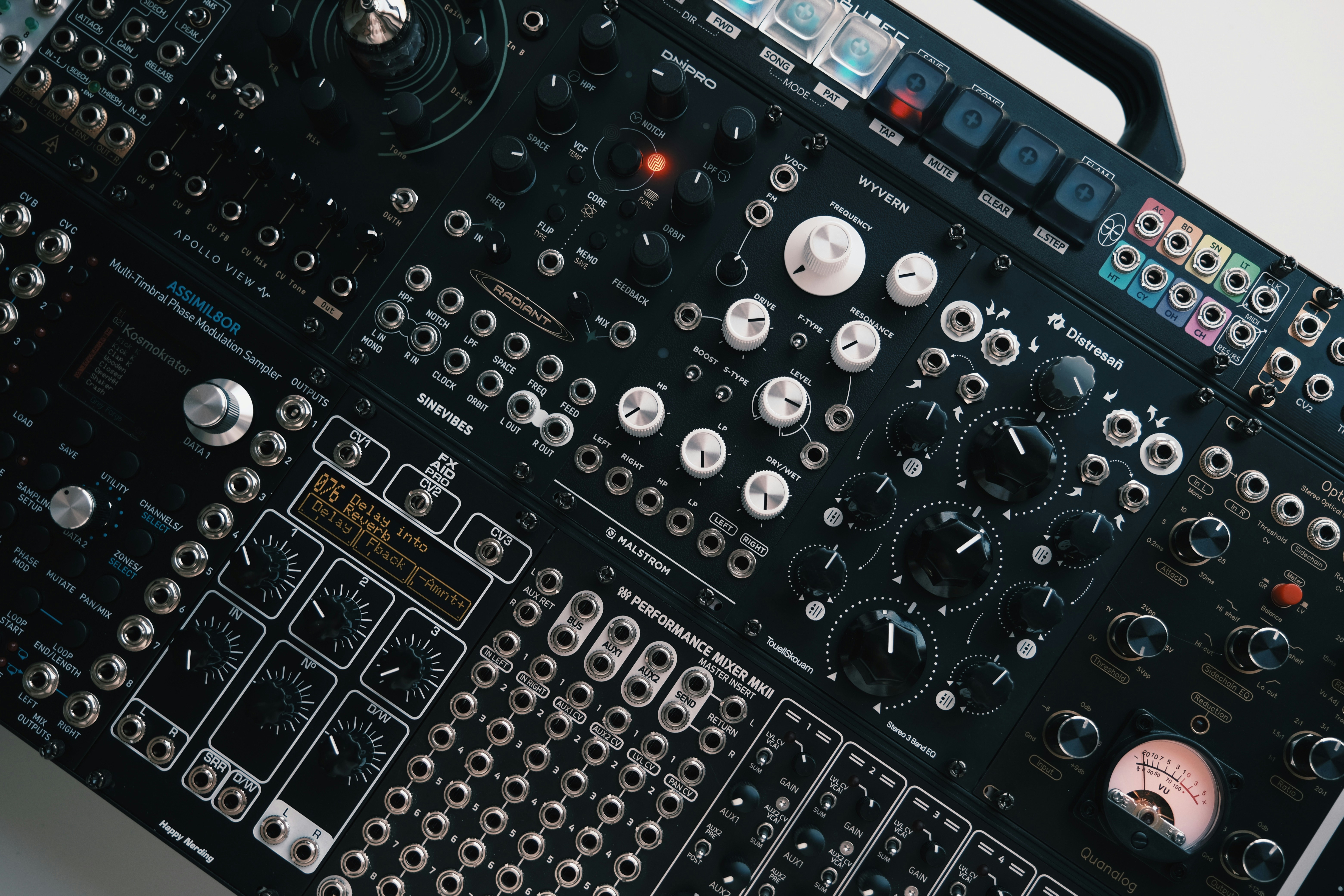 Close-up of a complex electronic music synthesizer panel.
