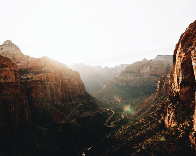 Sunlight streaming over a canyon overlook in Zion National Park, Utah