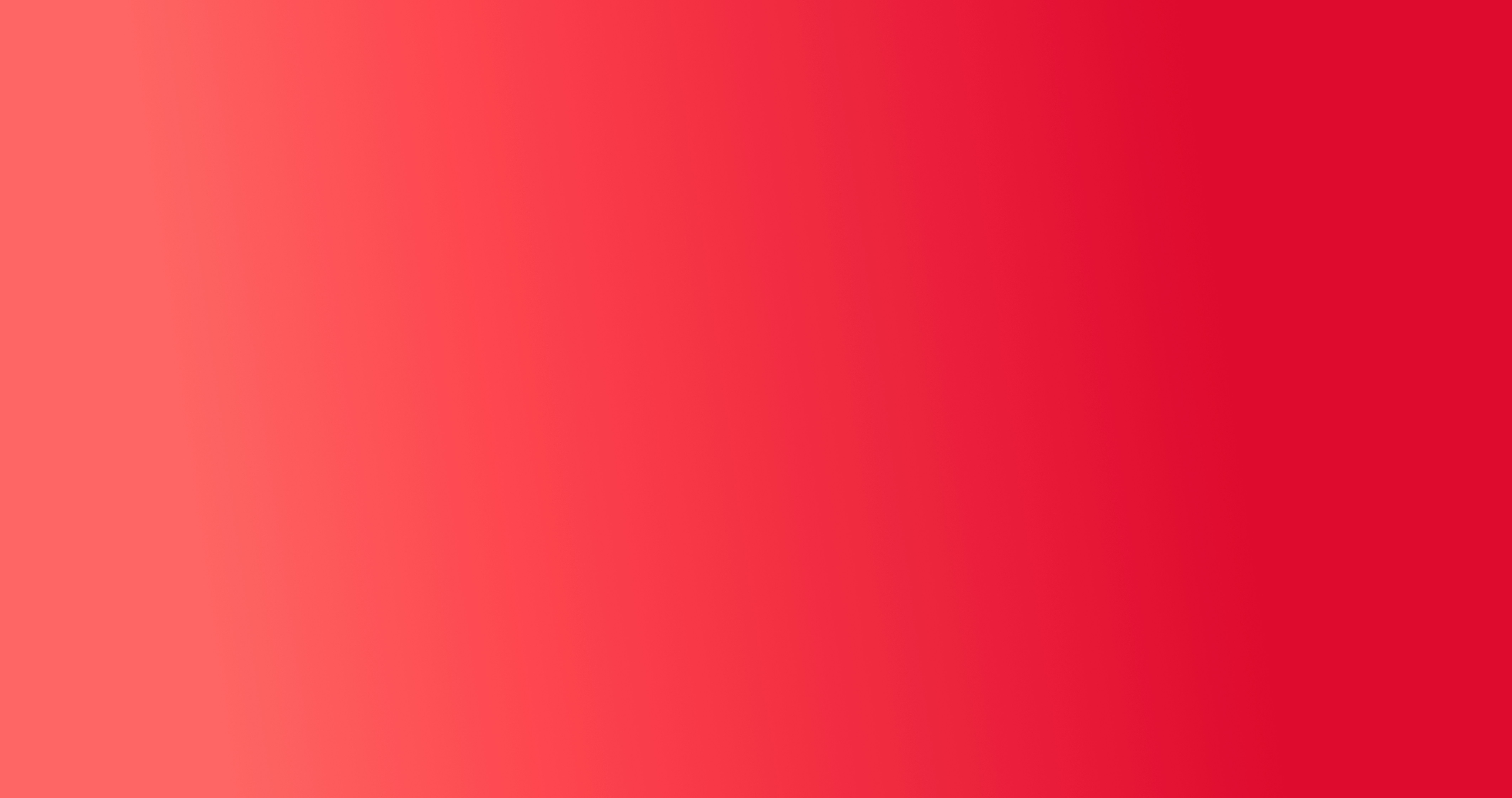A vibrant gradient of red and pink colors.