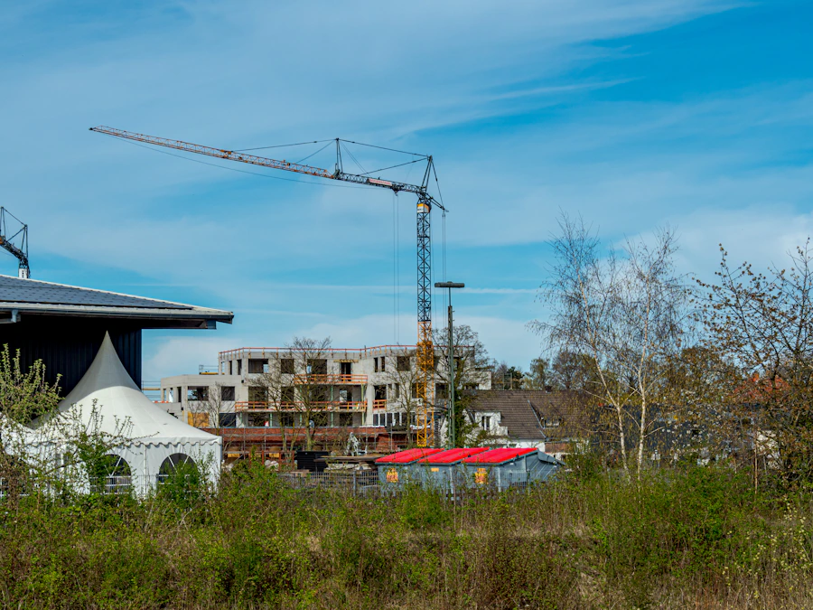 IronPeak field superintendent reviewing structural plans on Matthews job site