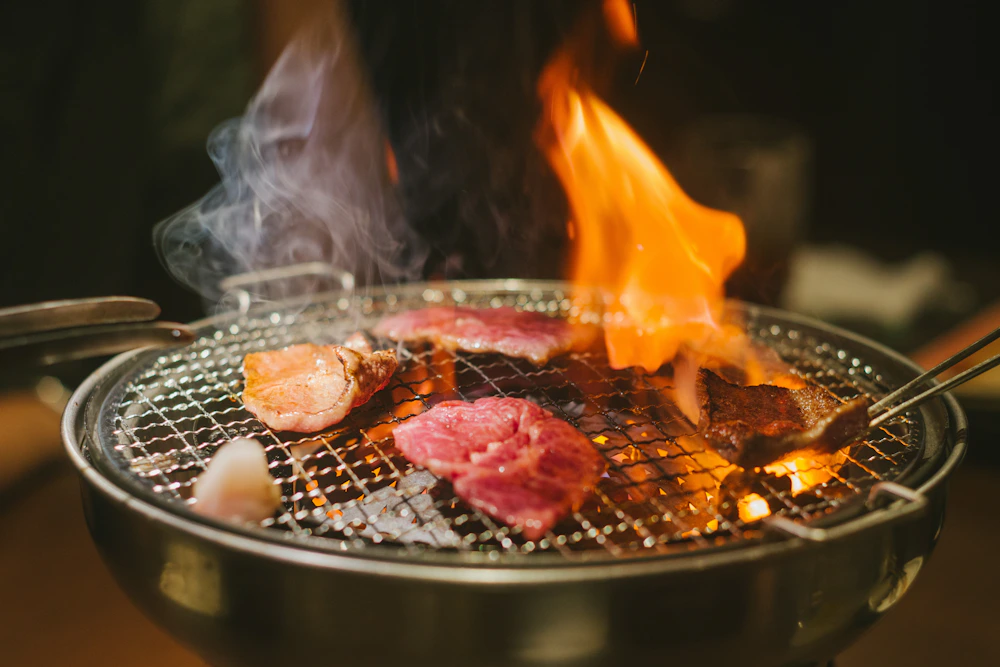 Food being prepared on a grill