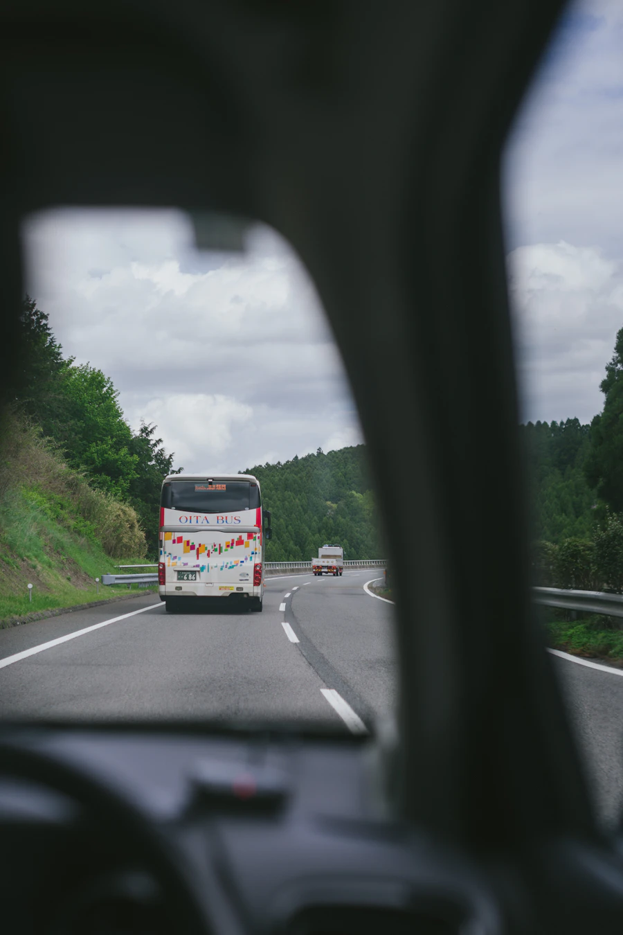 Tour bus travelling on a scenic road