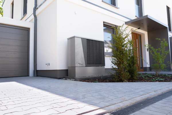 Modern house with heat pump installation