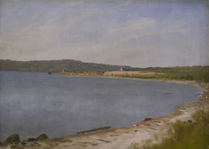 Calm water with boats in evening light