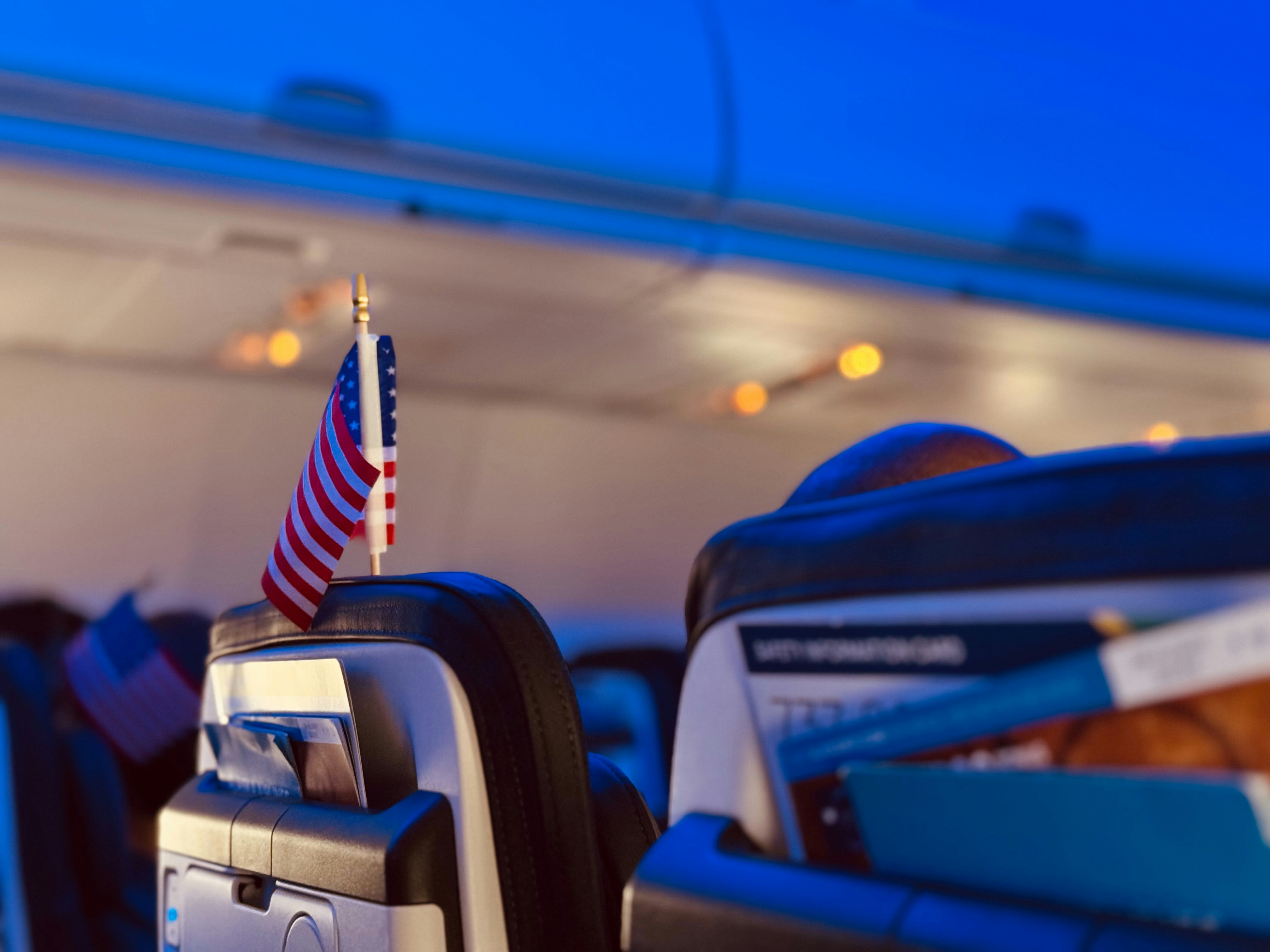 An American flag in an airplane seat during an Honor Flight