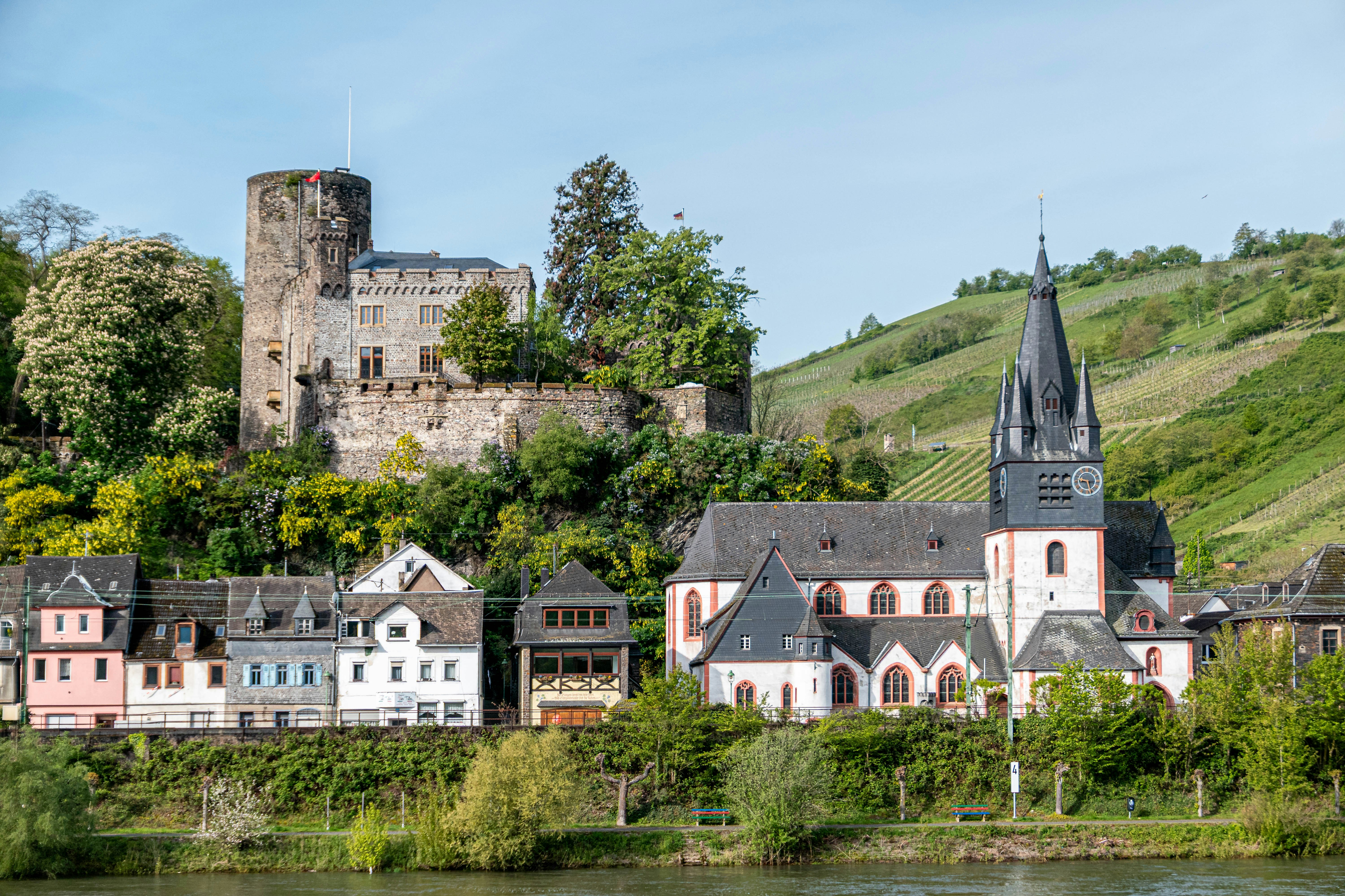 Historic castle and church overlooking a small town