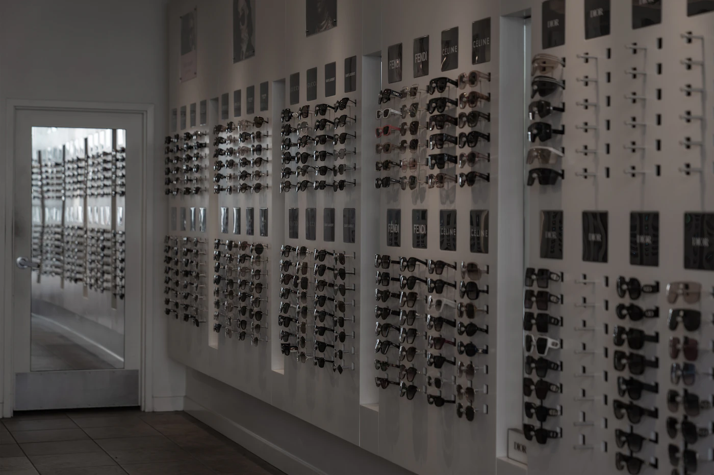 Wall display of sunglasses in an optical shop